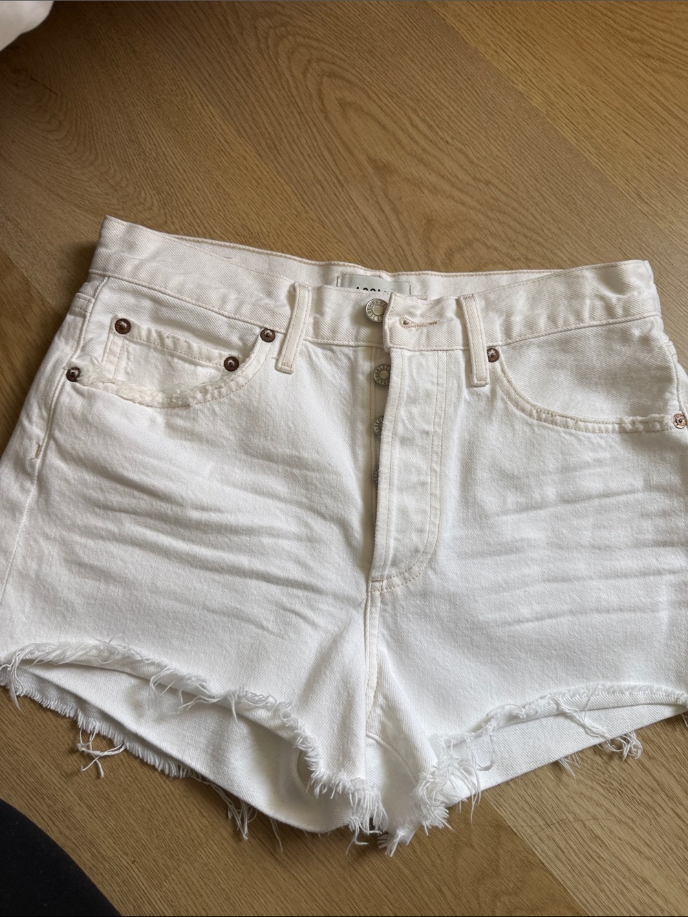 Agolde White Frayed Denim Cutoff Shorts